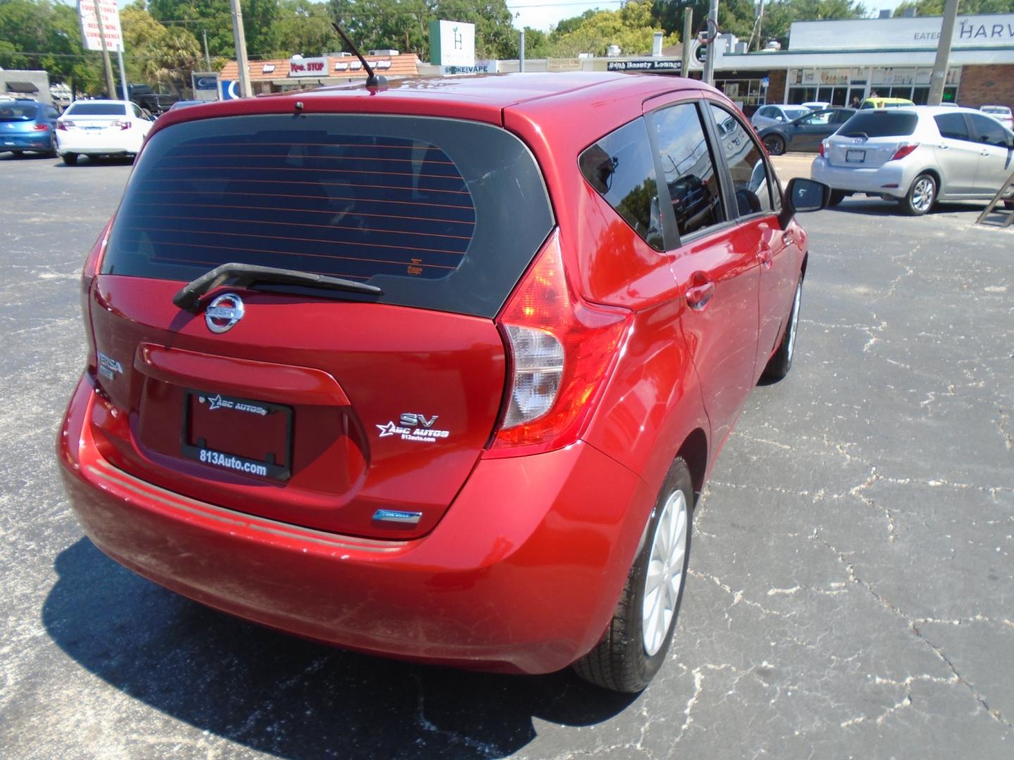 2015 Nissan Versa Note S 5MT (3N1CE2CP7FL) with an 1.6L L4 DOHC 16V engine, 5-Speed Manual transmission, located at 6112 N Florida Avenue, Tampa, FL, 33604, (888) 521-5131, 27.954929, -82.459534 - Photo#3